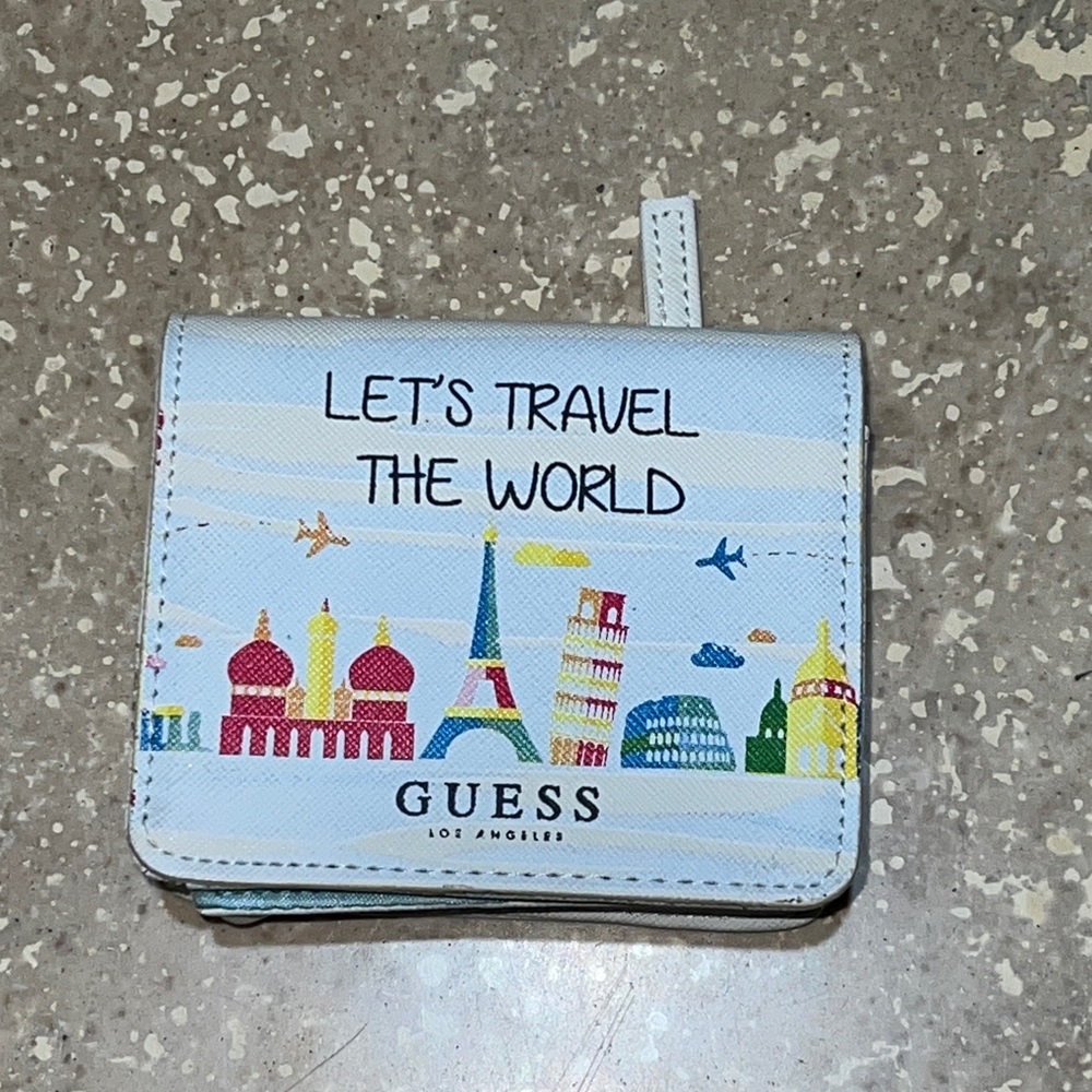 GUESS new with tags LETS TRAVEL THE WORLD FRENCH WALLET